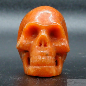 Orange Calcite Human Skull