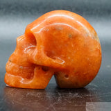 Orange Calcite Human Skull