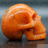 Orange Calcite Human Skull