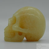 Orange Calcite Human Skull