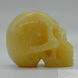 Orange Calcite Human Skull